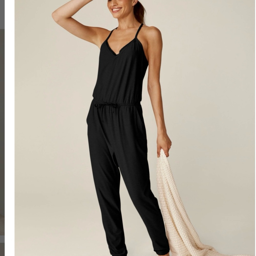 Beyond Yoga featherweight dream lace racetrack Black Jumpsuit XS. New with tags